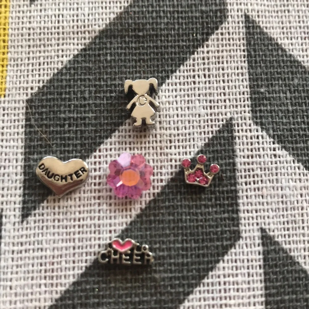 Five Origami Owl girl charms